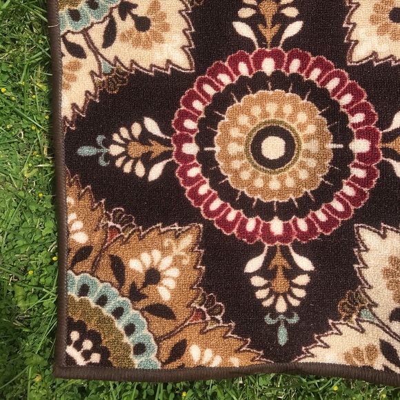 SOLD 40" by 60" patterned rug. Never been used. - Picture 2 of 4